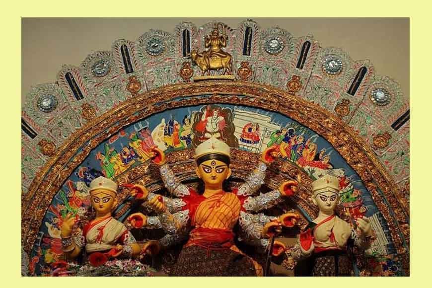 An ek-chala pratima under an arch of beaten silver foil and coloured pith