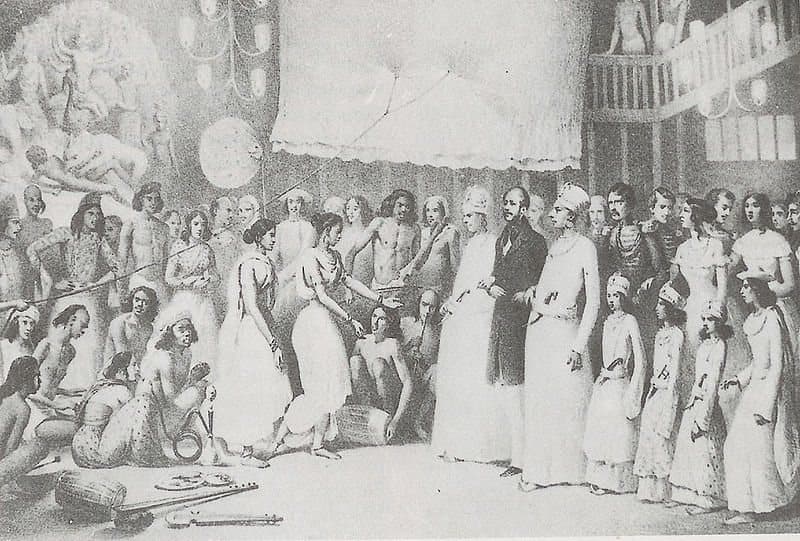 A household Puja photographed with the whole assembly present