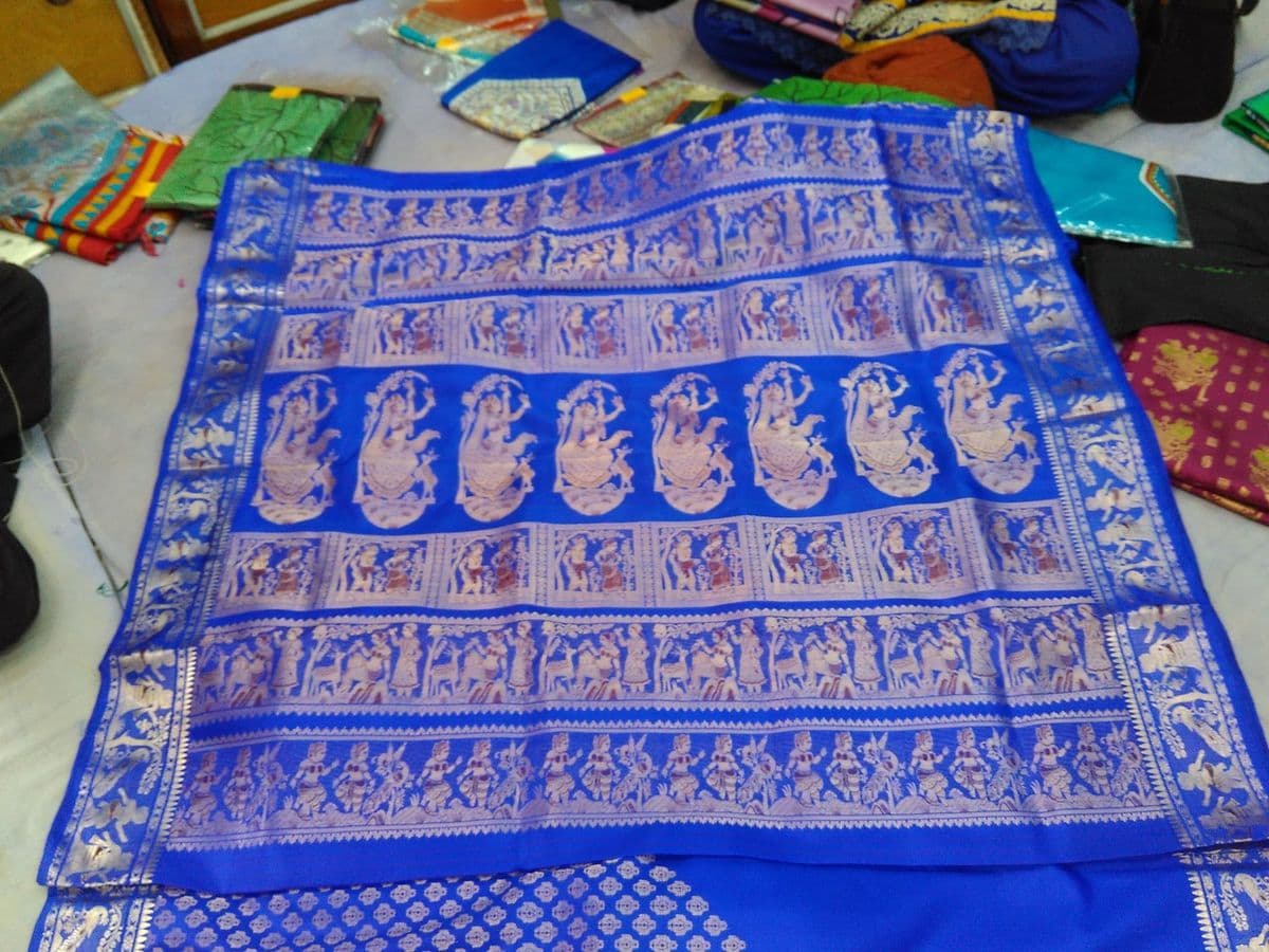 A Swarnachari from Bishnupur: the same narrative brocade as Baluchari, figured in gold and silver zari.