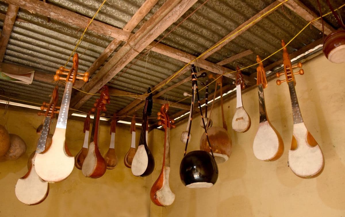 Baul instruments under construction: gourd bodies for ektara and khamak, skinned and fitted in the same households that sing.