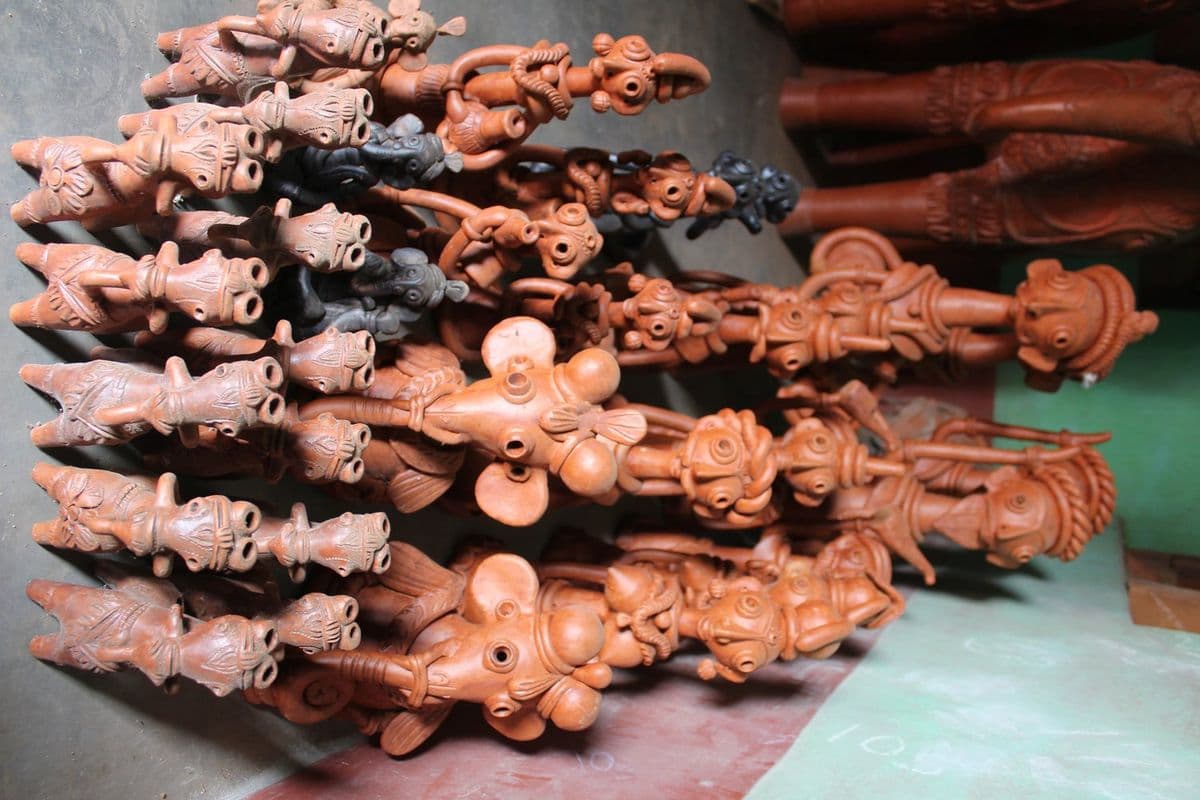 Terracotta work at Panchmura in Bankura, the village whose sixty-odd potter families still supply most of the trade.