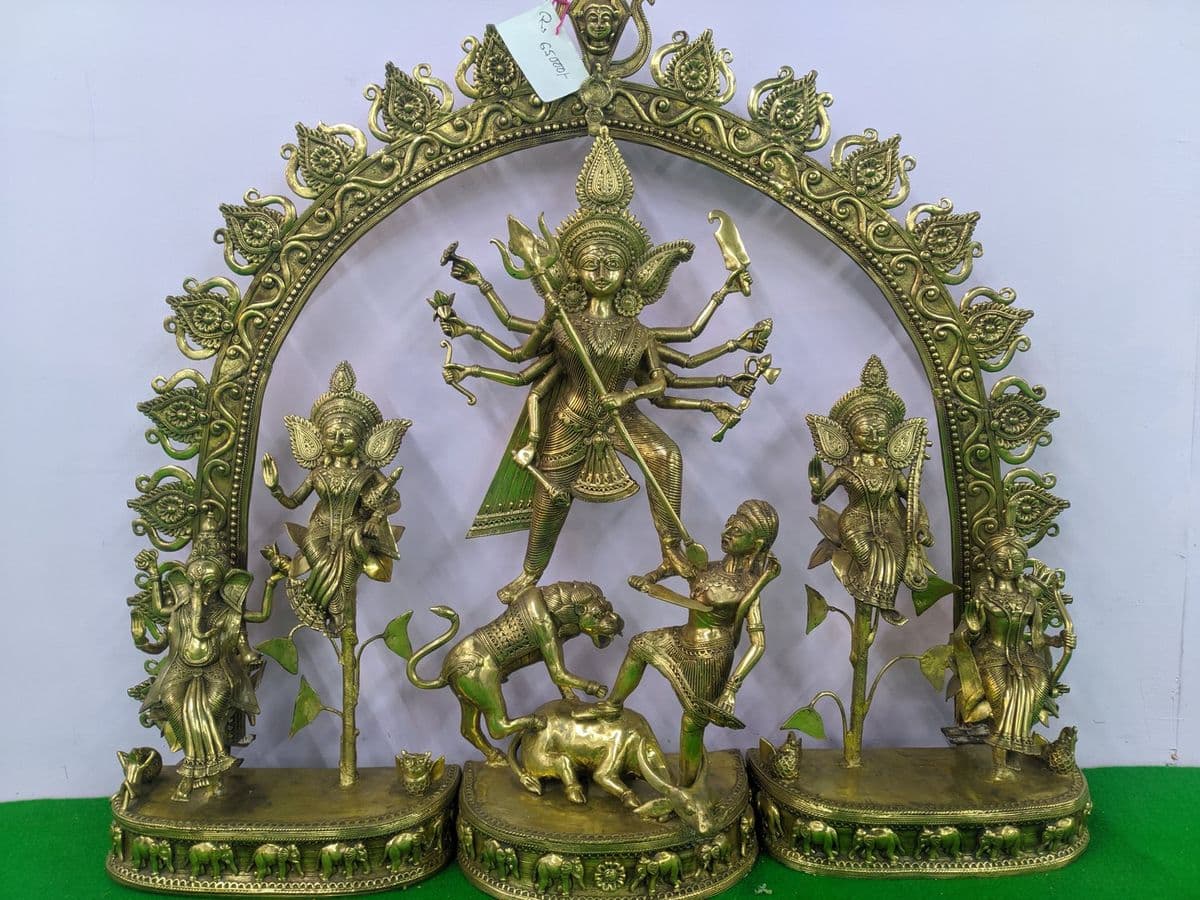 A Durga image cast in Dokra: the festival market that now sits alongside the craft's older utilitarian and votive work.